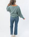 Back view of Free People Jade Ash Quinn Knit Thermal showcasing relaxed fit and textured knit design, perfect for casual layering looks.