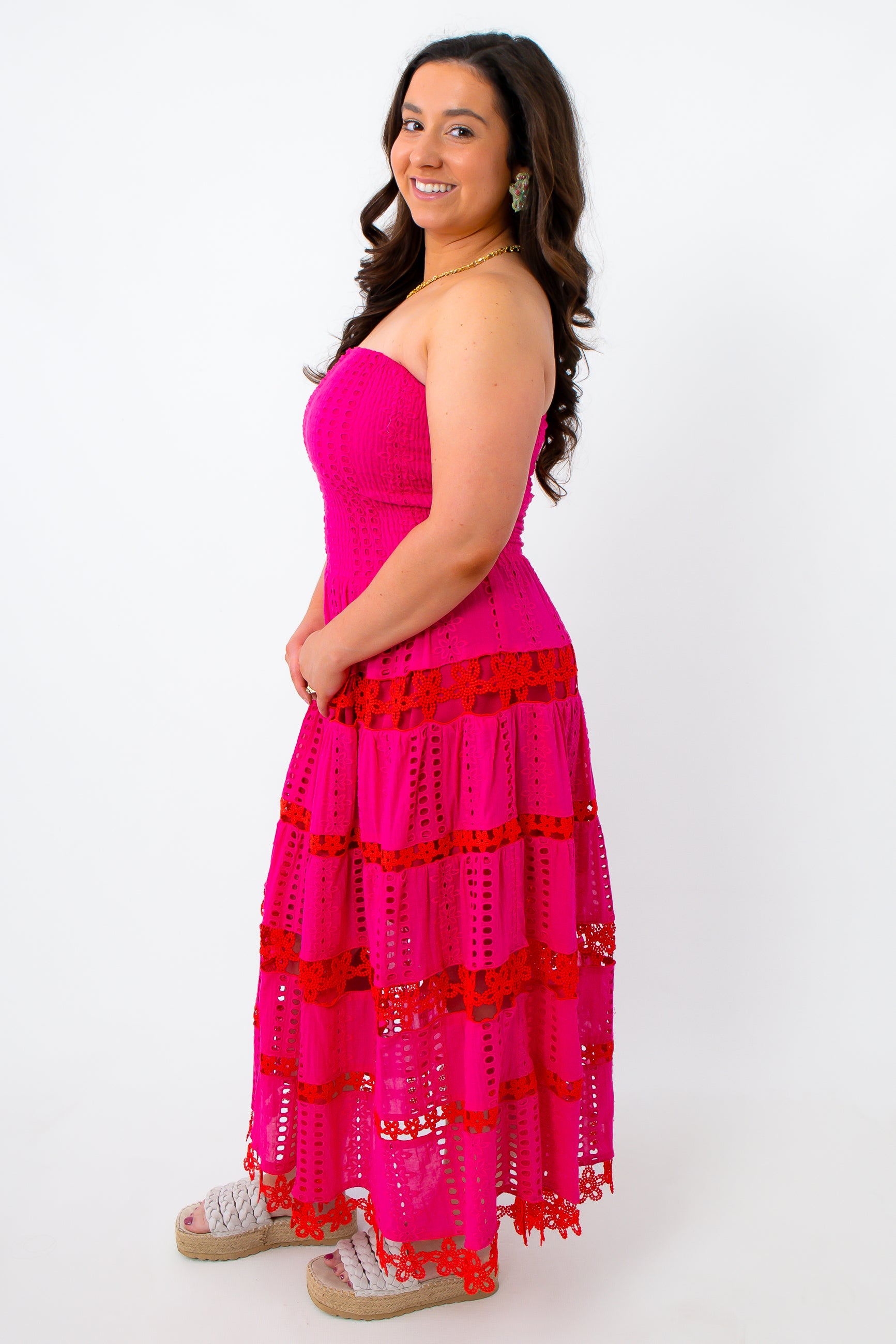 Fuchsia Fuego eyelet strapless midi dress side view