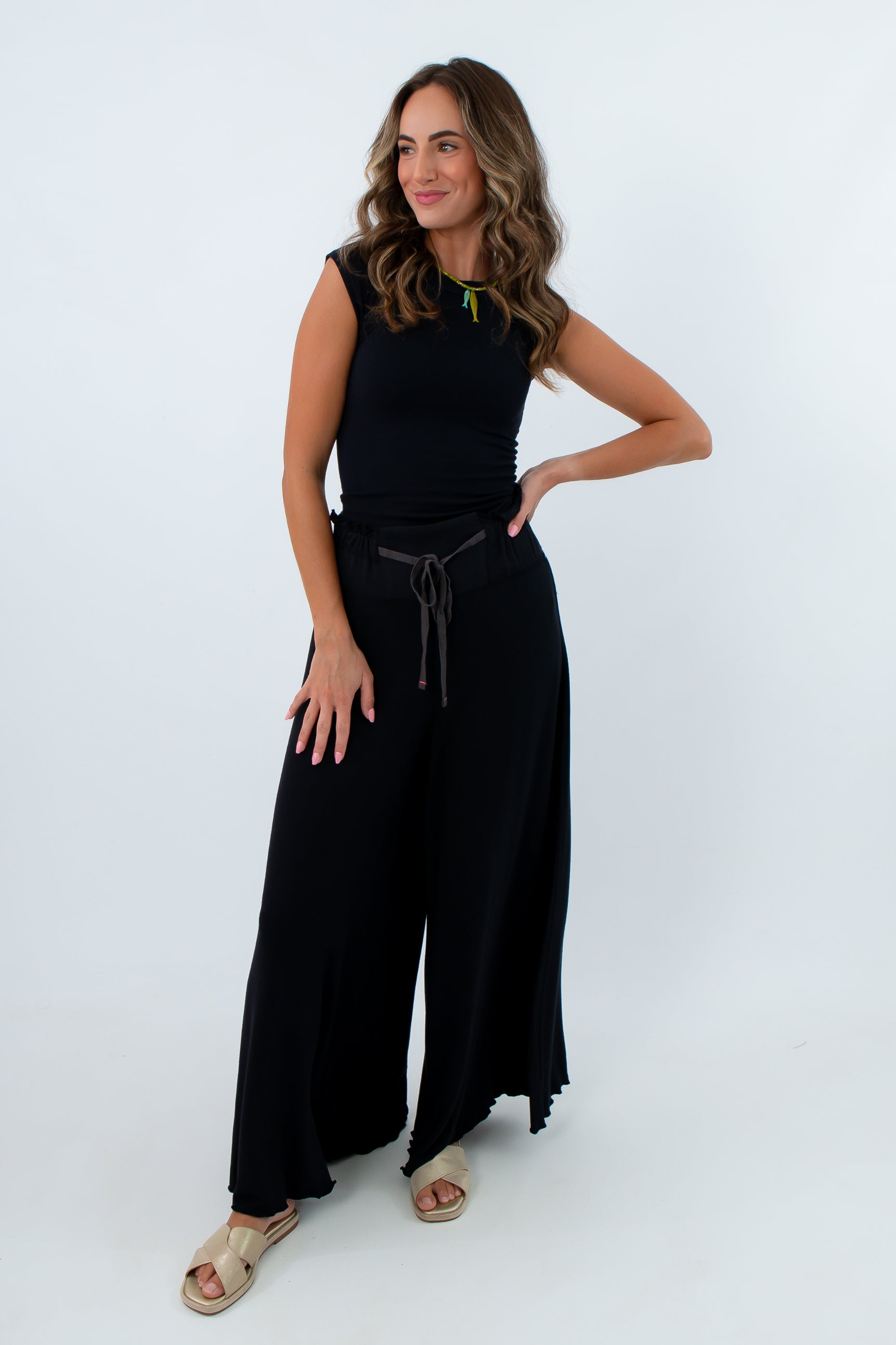 free people wide leg black lounge pant travel outfit