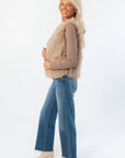 Side view of Fifth Avenue Taupe Faux Fur Vest showing soft faux fur texture and flattering fit. Stylish women’s vest for fall and Thanksgiving outfits.