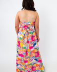 Colorful abstract summer dress with strapless design and tie back