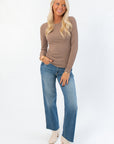 Boutique essential Roxi Ribbed Knit Top in clay taupe, perfect for layering with jeans and boots for a cozy fall outfit.