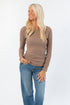 Roxi Ribbed Knit Top in clay taupe with long sleeves and fitted silhouette, styled with casual denim for a boutique fall layering look.