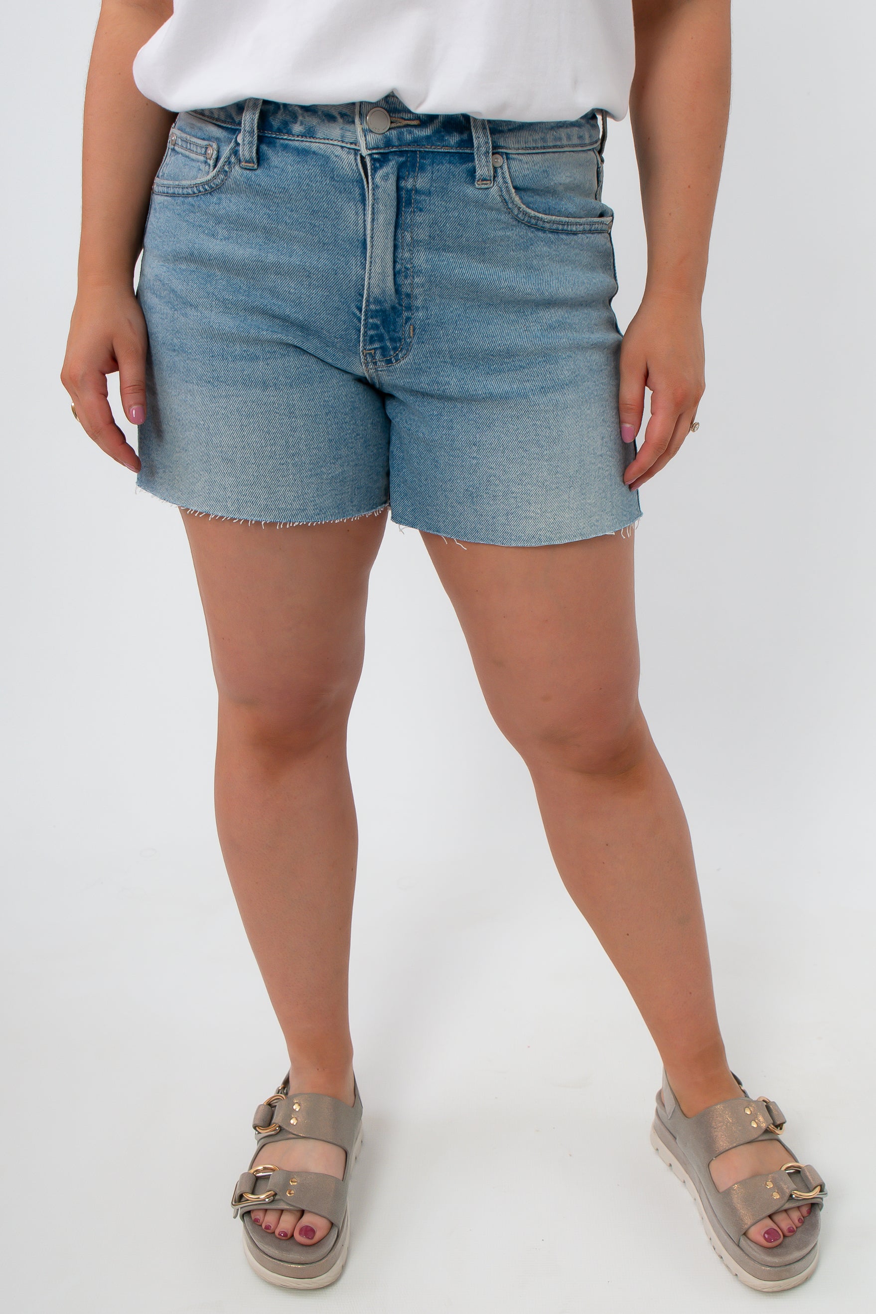 High-waisted light wash denim shorts with frayed hem, women's summer jean shorts