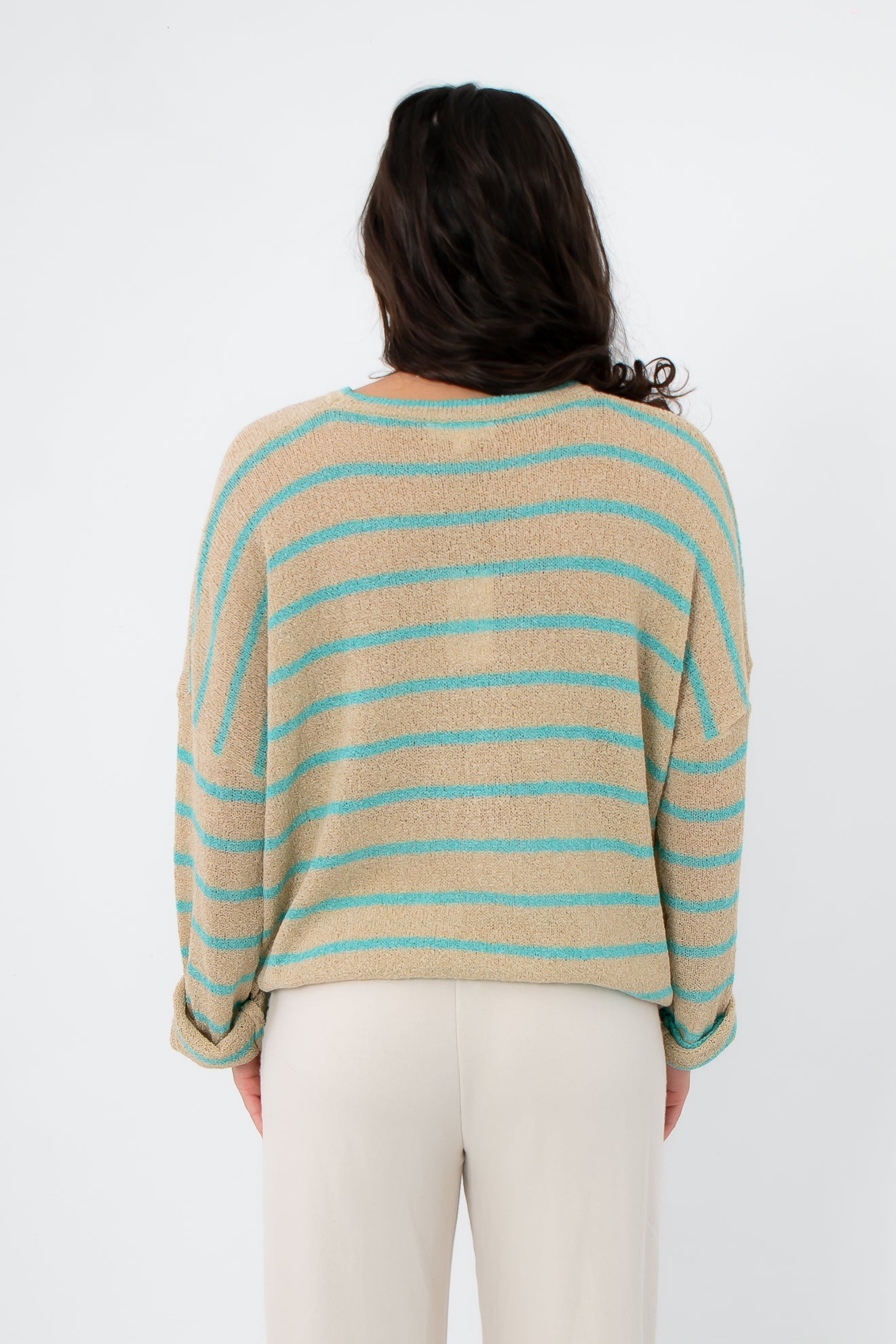 Back view of Coastal Spring Stripe Sweater with mocha and aqua horizontal stripes, highlighting its relaxed fit and soft knit texture.