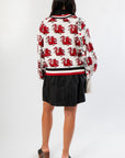 Back view of Queen of Sparkles USC Gamecocks Mascot Rhinestone Cardigan with all-over red Gamecock design and varsity-style striped hem.