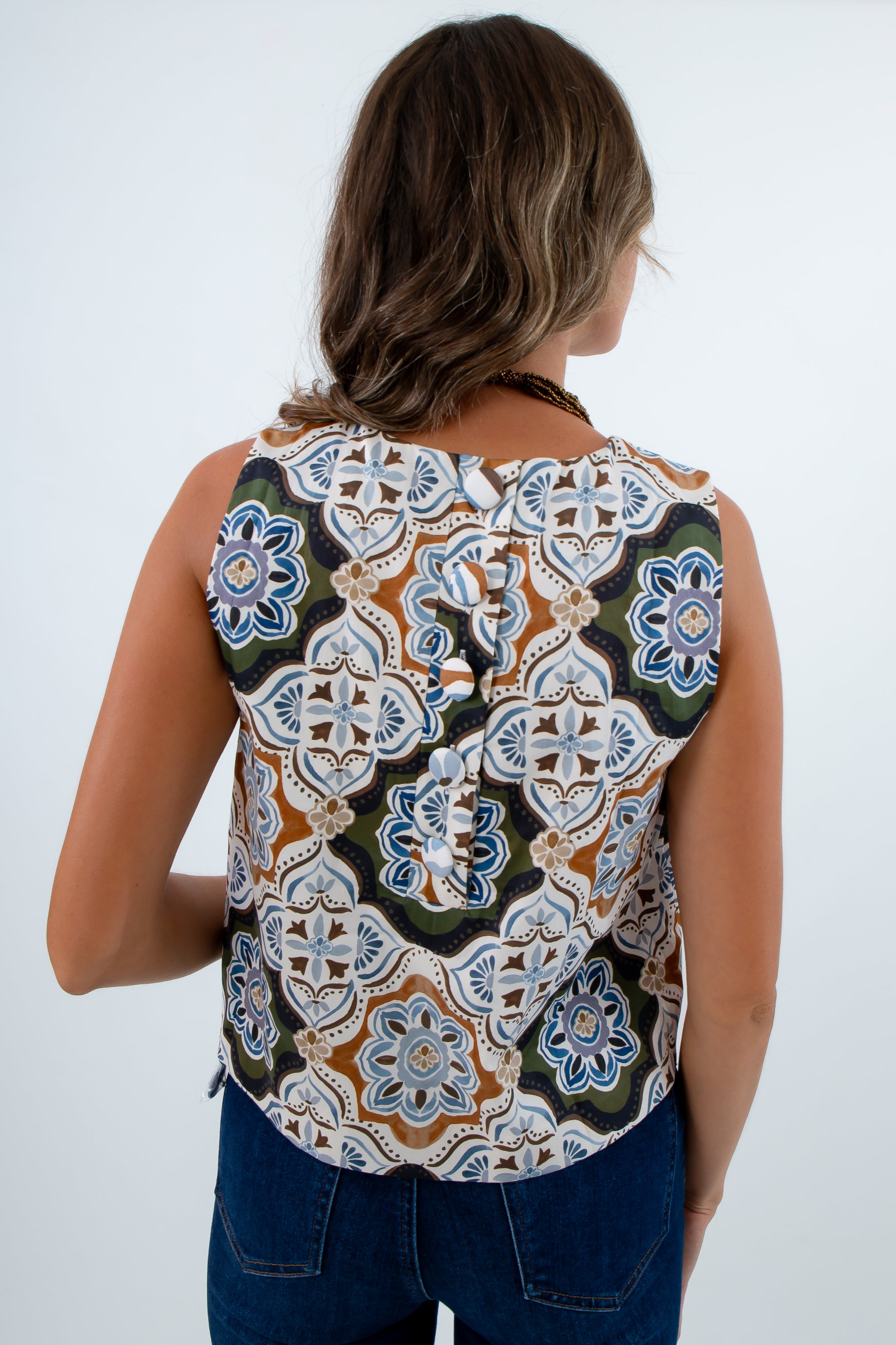 Hip length mosaic patterned sleeveless top for fall, top with buttons down the back, fall sleeveless top