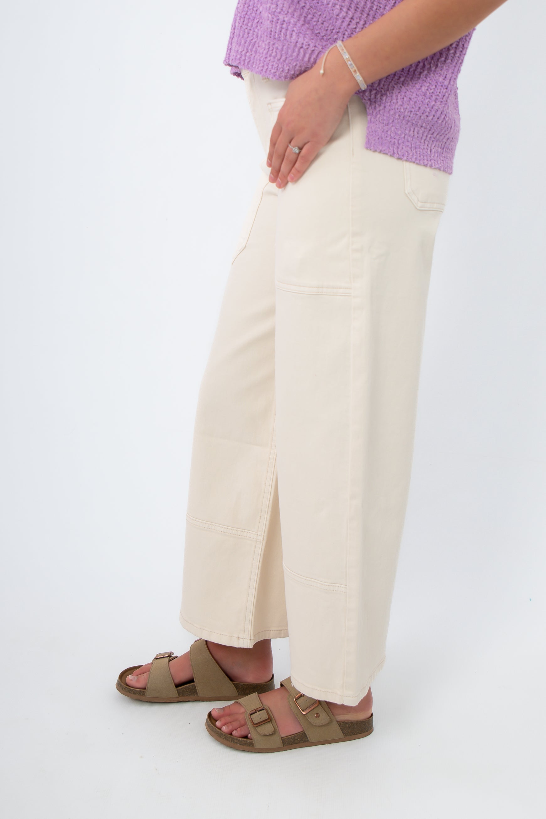 Side view of Sea Salt Ecru Cropped Wide Leg Jean showing wide leg silhouette and soft stretch denim fabric for a slim fit.