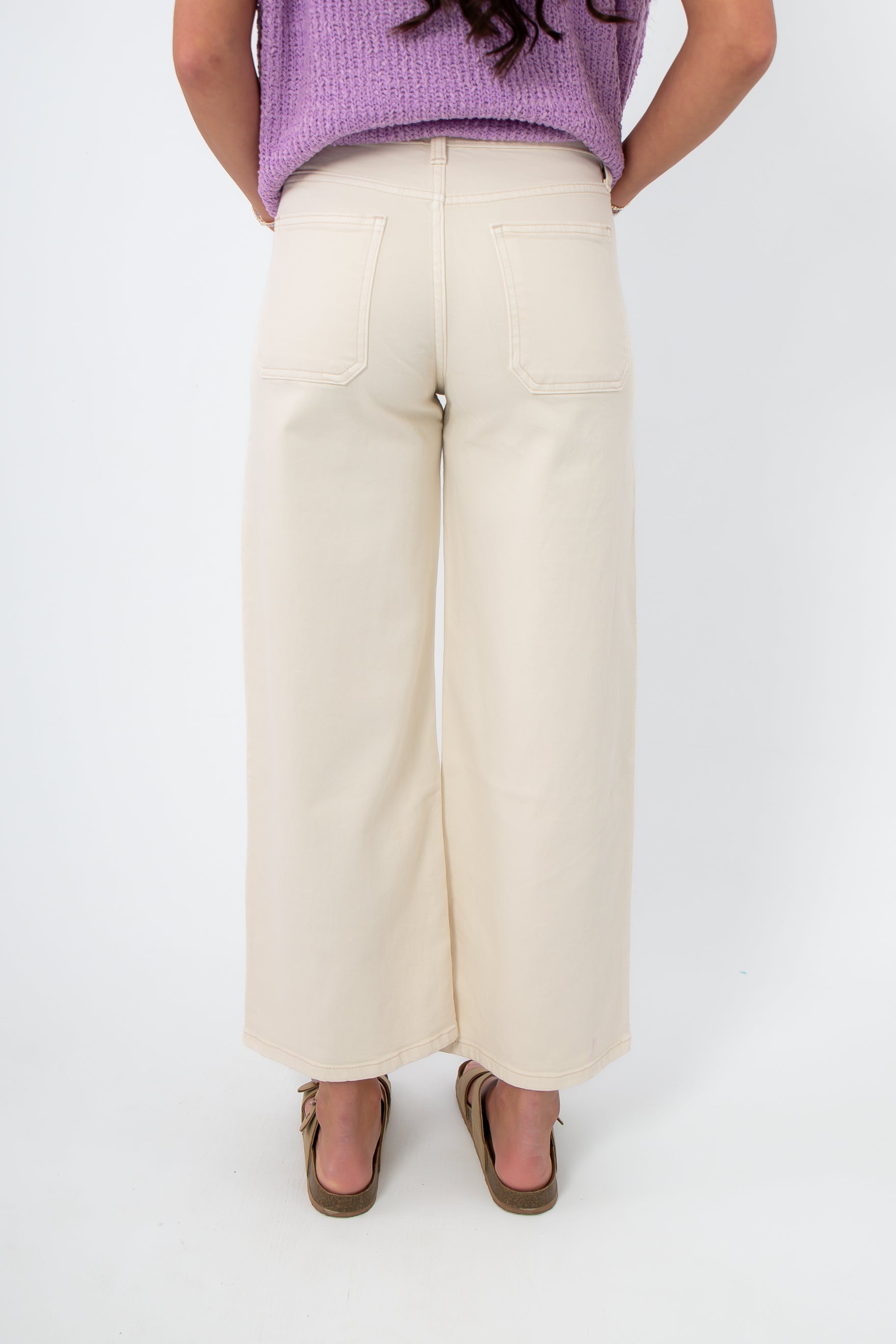 Back view of Sea Salt Ecru Cropped Wide Leg Jean featuring rear patch pockets and cropped hem, ideal for warm-weather outfits.