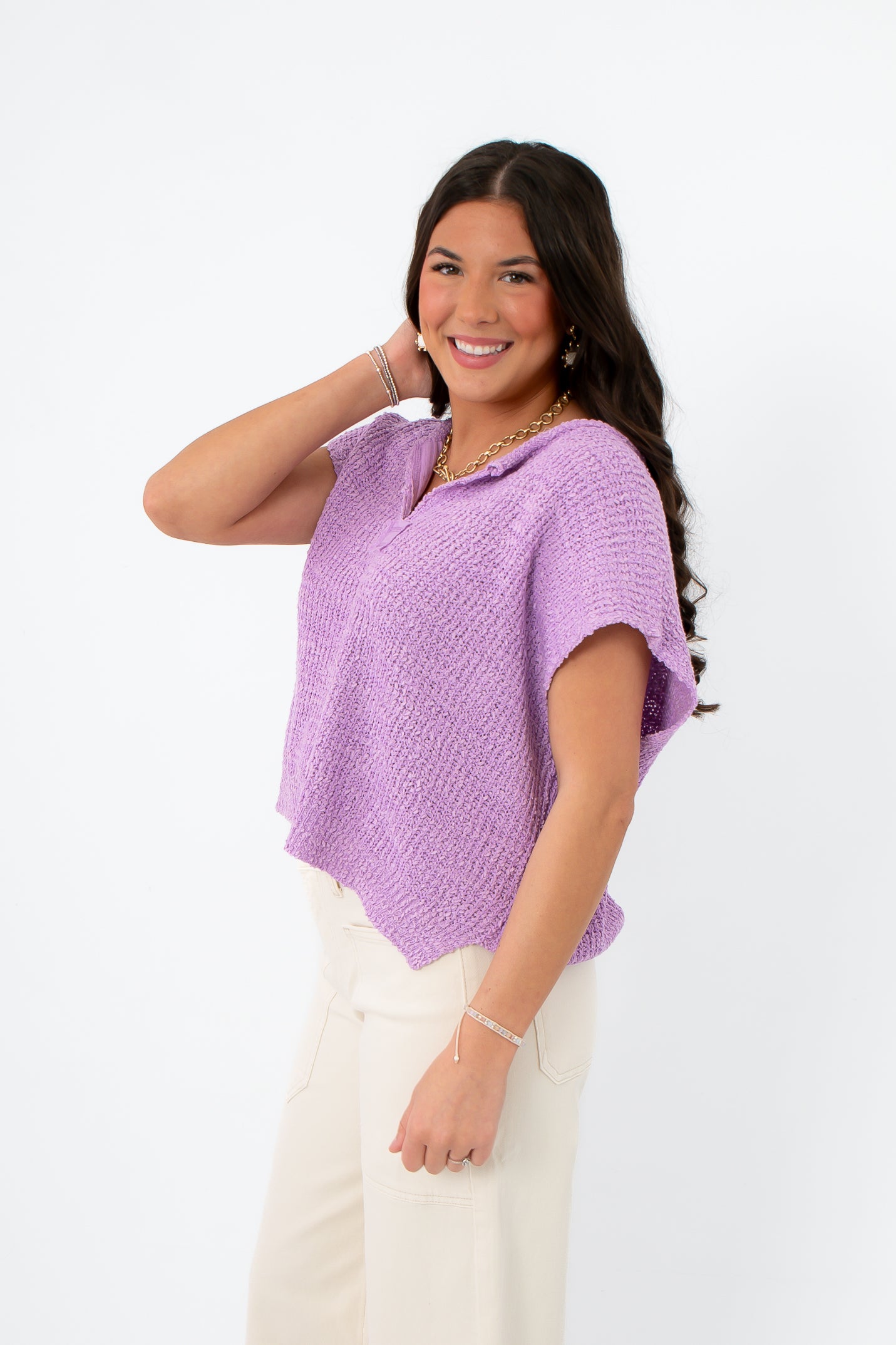 Side view of Wisteria Willow Lilac Crop Sweater showing relaxed fit and soft knit texture, ideal for breezy spring days and casual wear.