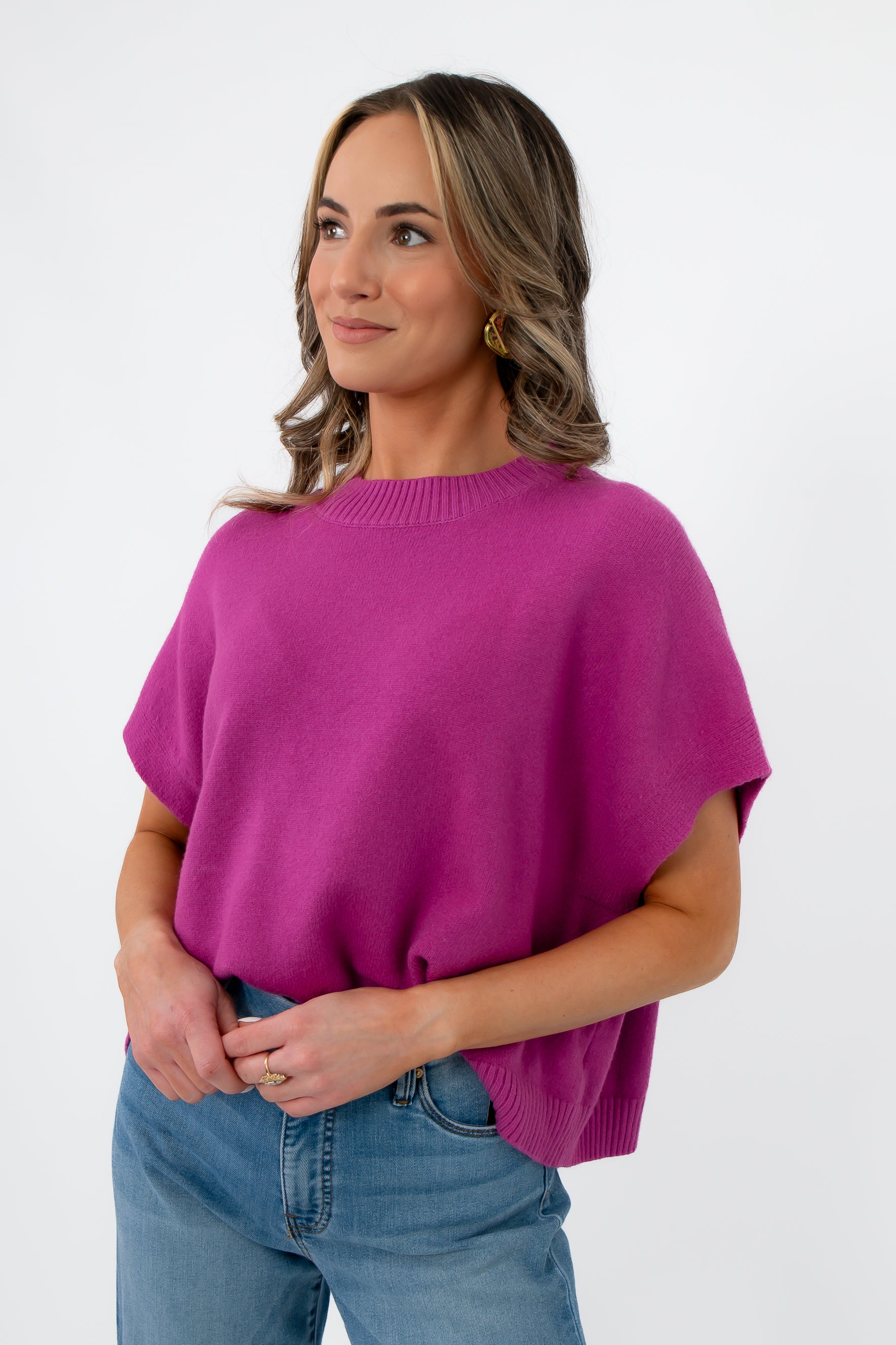 Close-up of Whatever The Weather Orchid Sleeveless Sweater showing soft knit texture and relaxed fit. Ideal purple sweater for versatile layering.