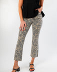 Close-up of Kut Kelsey High Rise Ankle Flare Leopard Pants highlighting the flattering fit, stretch material, and stylish leopard pattern.
