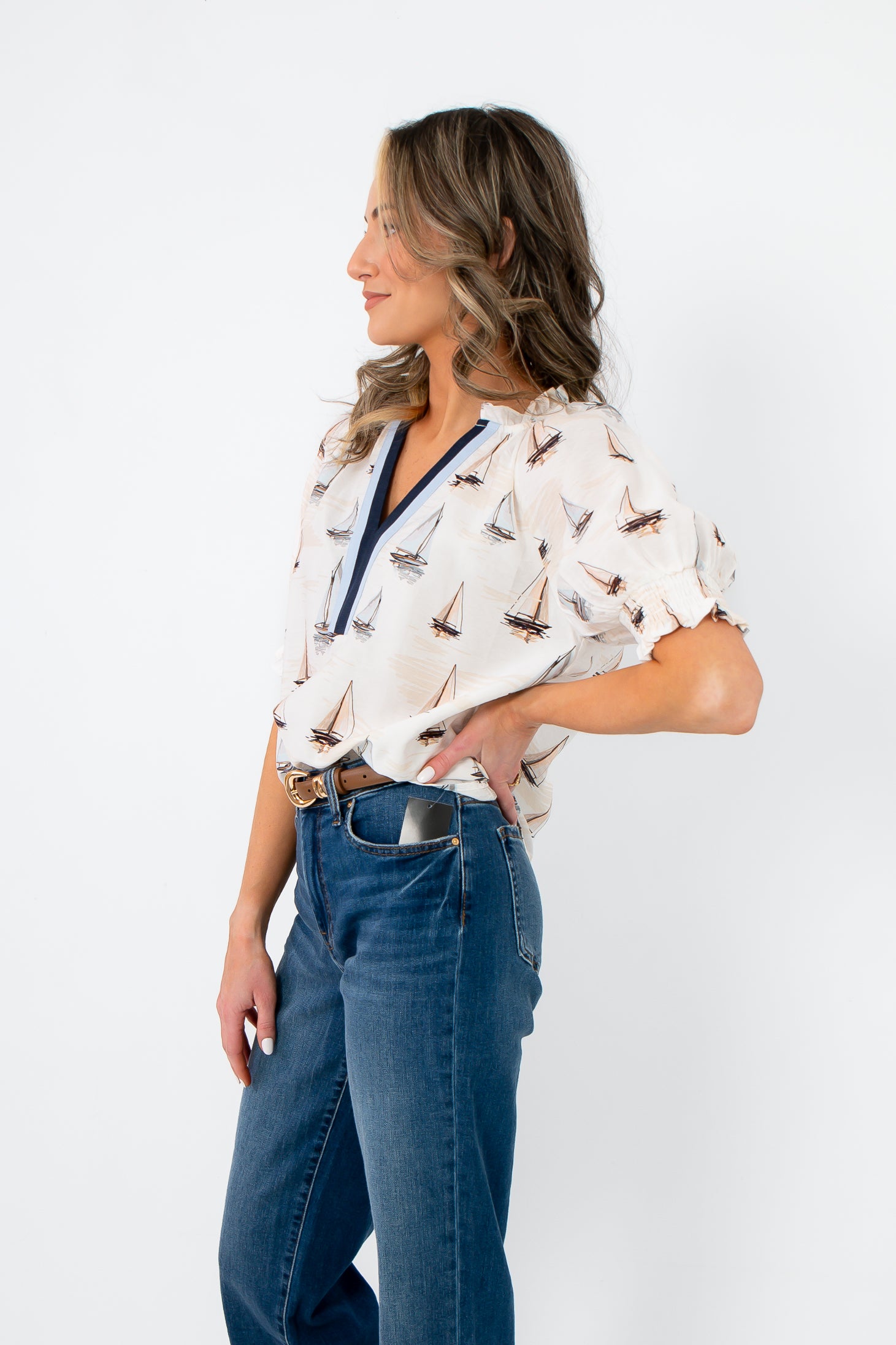 THML Sailboat Short Sleeve Blouse styled with denim and belt, showcasing its casual chic summer appeal.