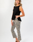 Side view of Black Flared Rib Knit Top – Stylish & Comfortable Knitwear with a flattering flared cut and ribbed texture for modern appeal.