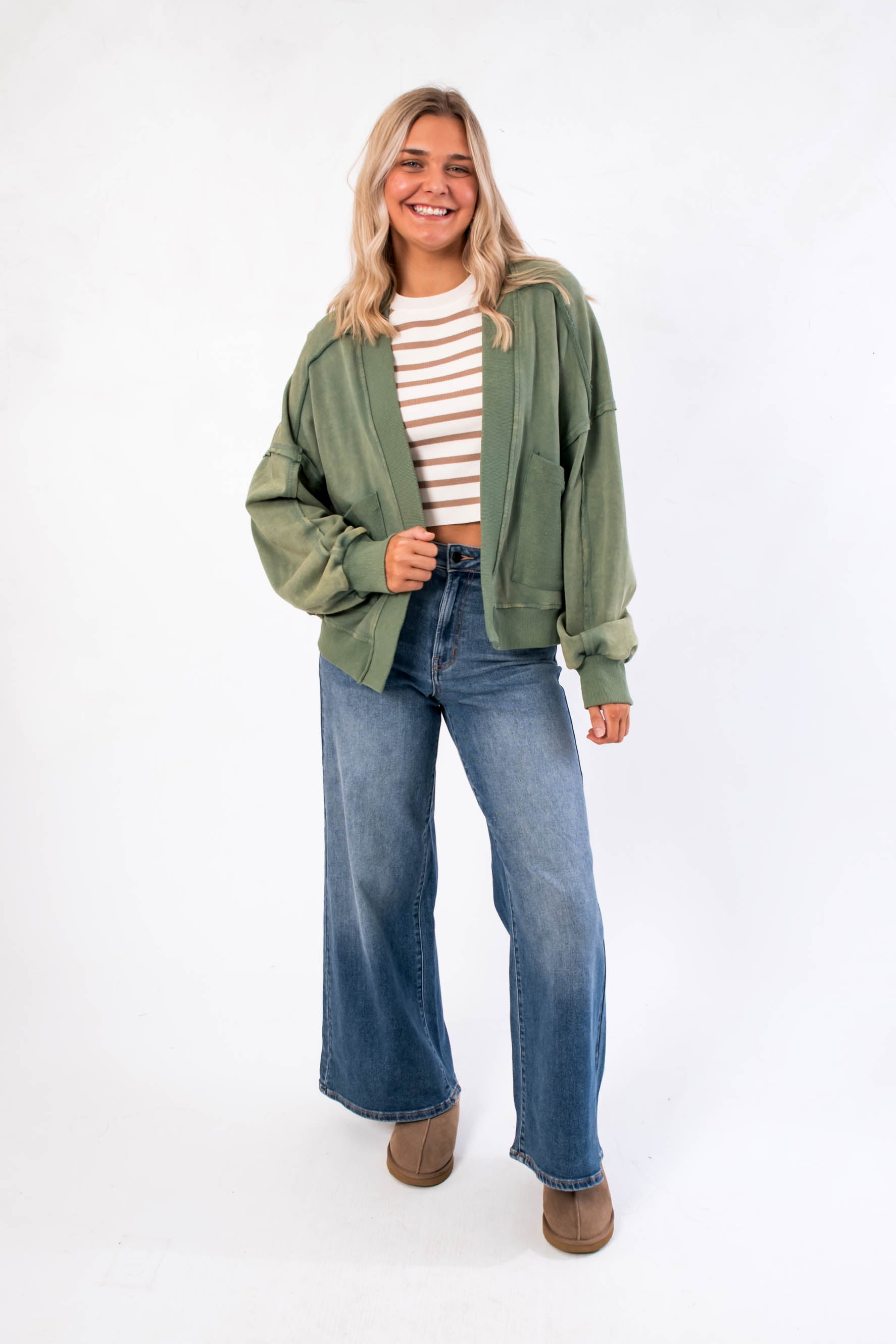 Full front view of the Weekend Moves Frosted Sage Terry Lounge Cardigan paired with jeans and boots, showcasing a cozy fall layering piece.