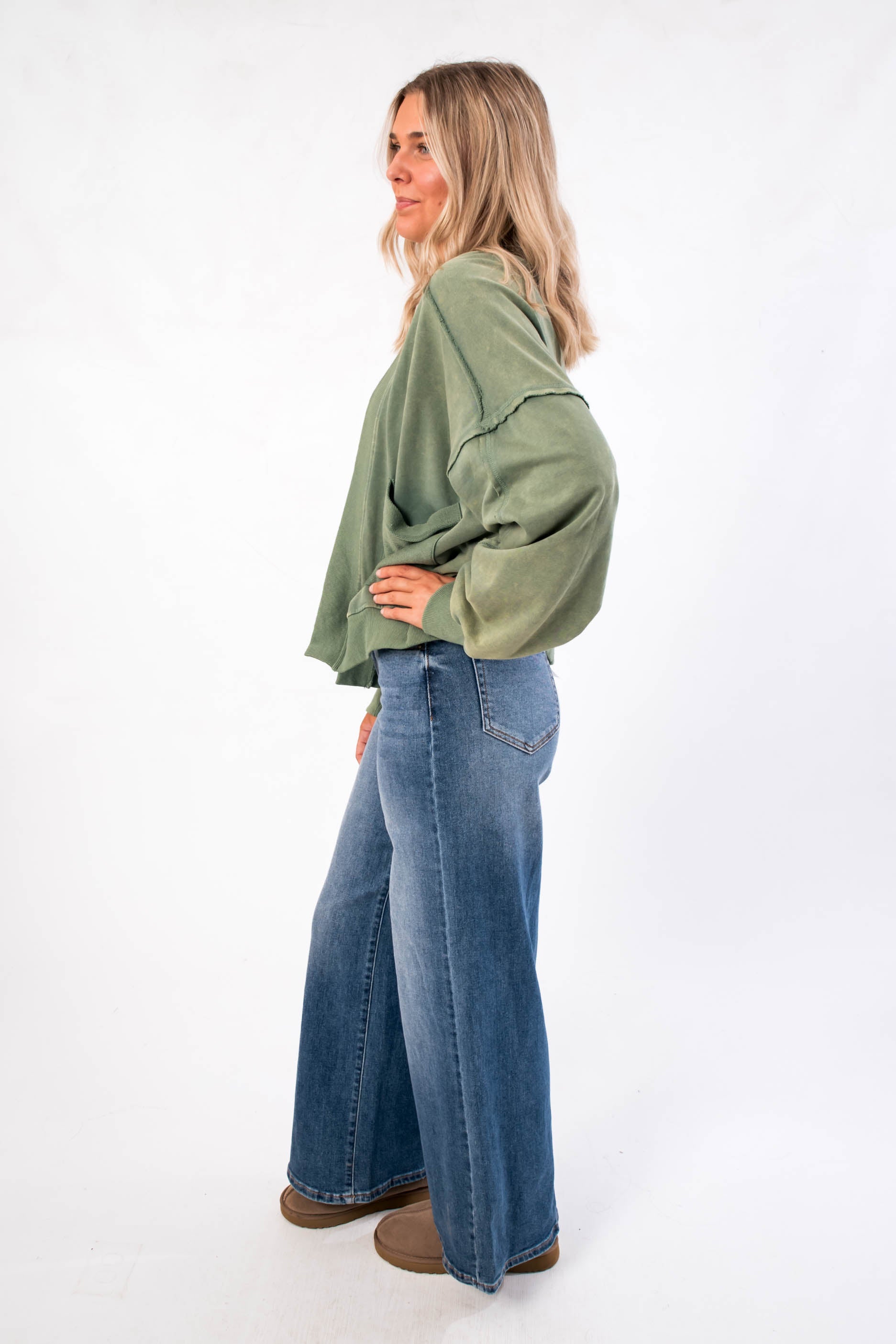 Side profile of the Weekend Moves Frosted Sage Terry Lounge Cardigan highlighting its drop shoulders and casual silhouette for fall lounging.