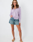 Front view of lavender half zip sweatshirt, casual style