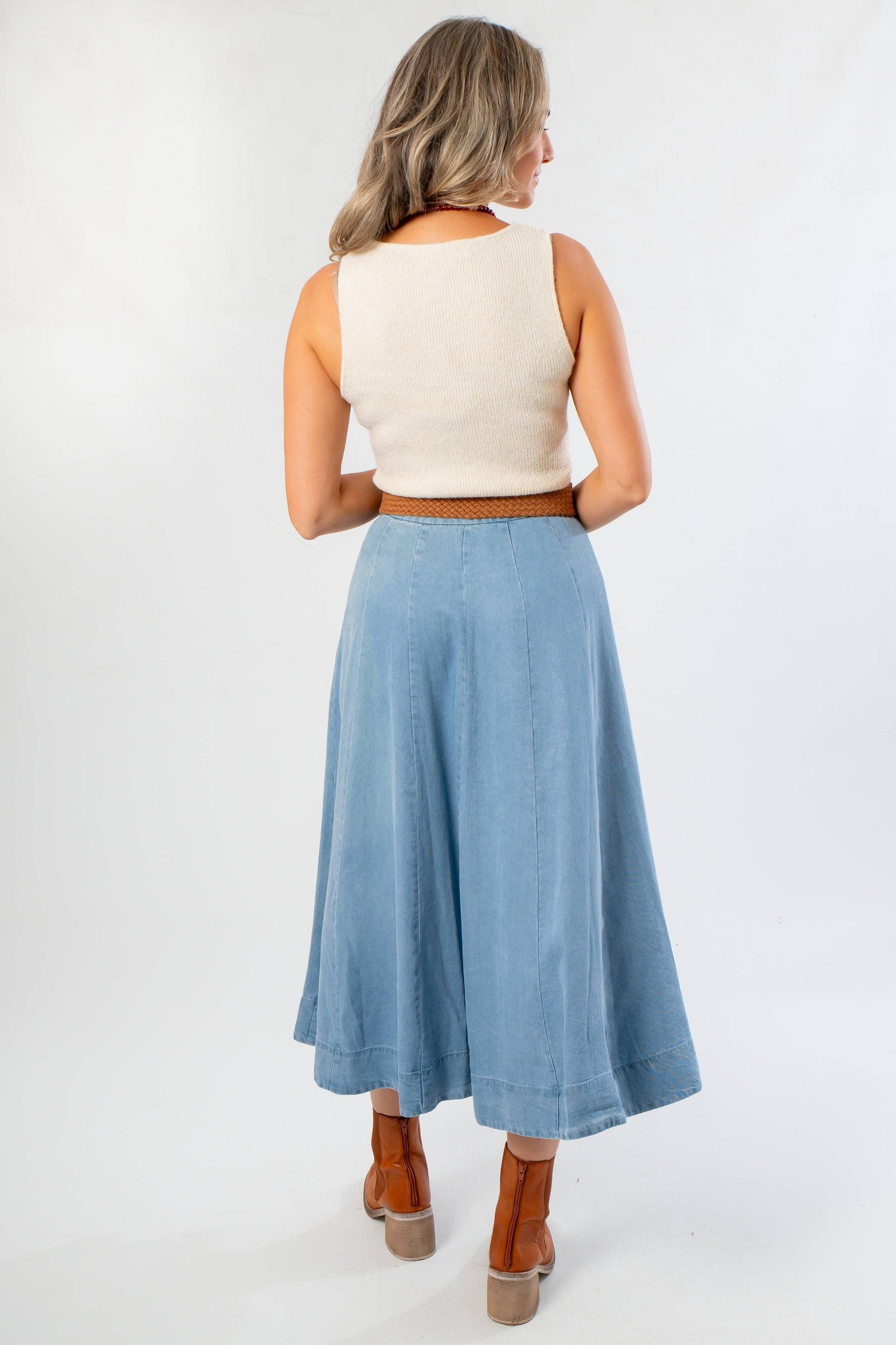 Back view of Polly Cream Knit Sleeveless Top showing ribbed knit texture and flattering fit, styled for versatile fall fashion.