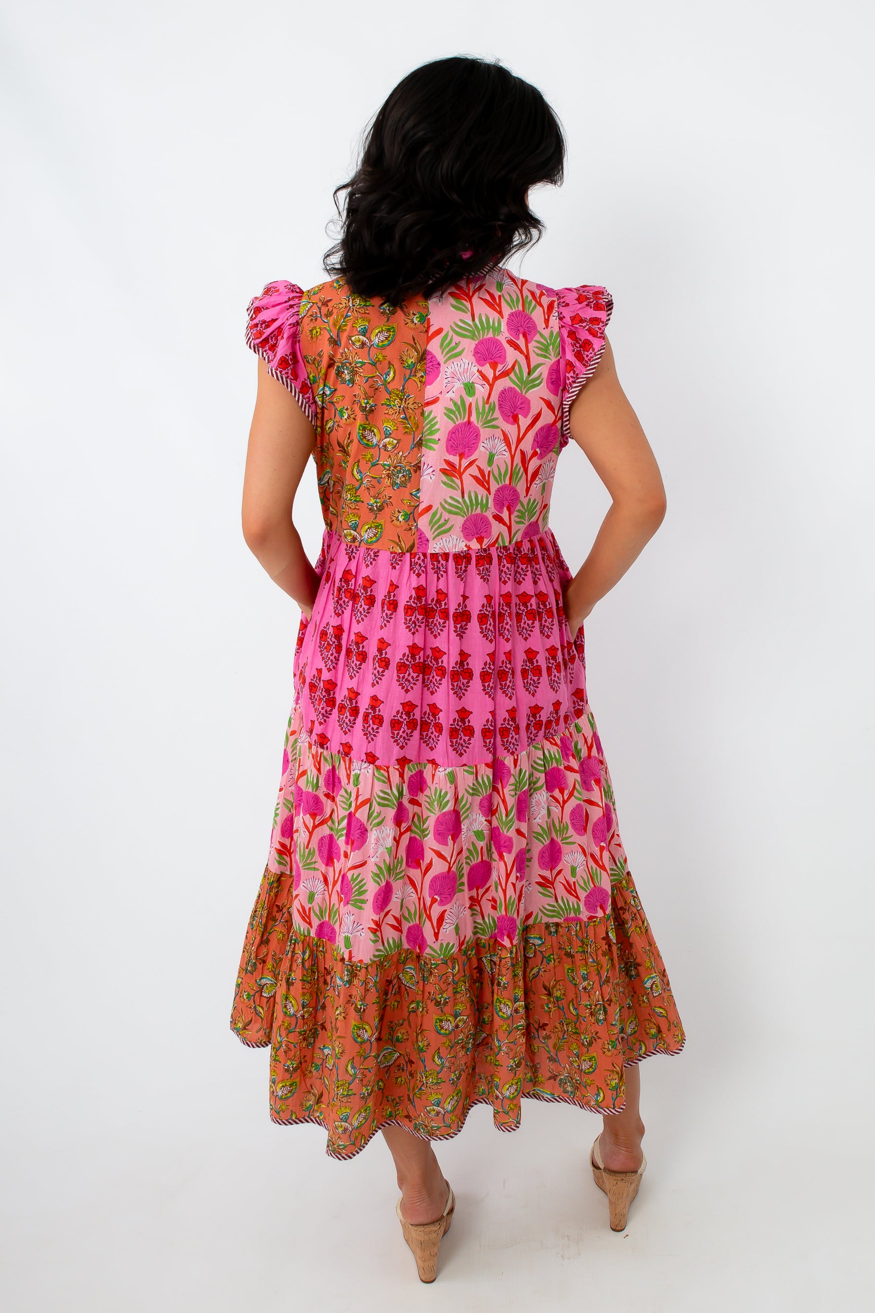 Colorful patchwork tiered midi dress with floral and geometric patterns