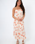 Front view of Shelby Red Seashell Printed Strapless Dress showcasing red seashell and starfish prints on a cream midi-length fabric.