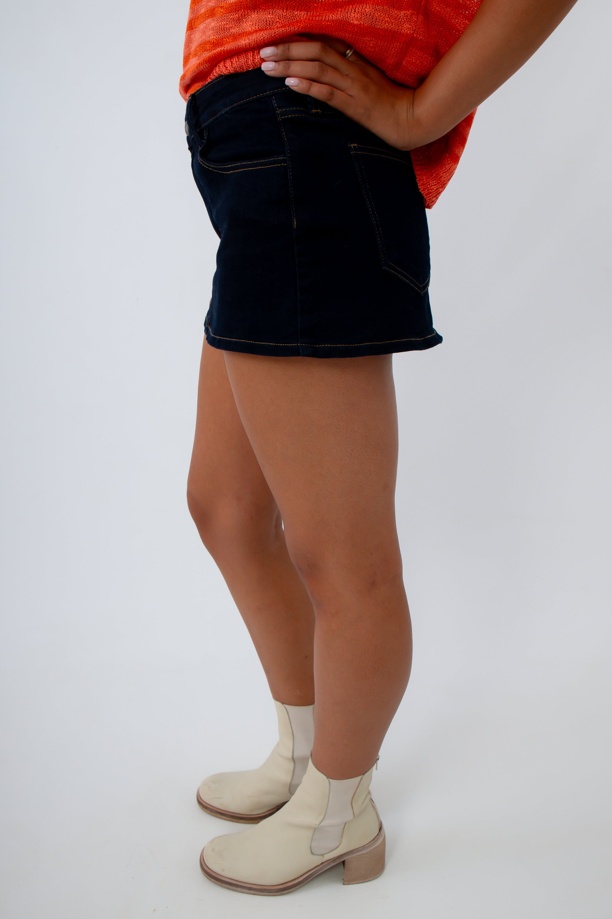 Neutral game day outfit, dark denim skort, black denim mini skort