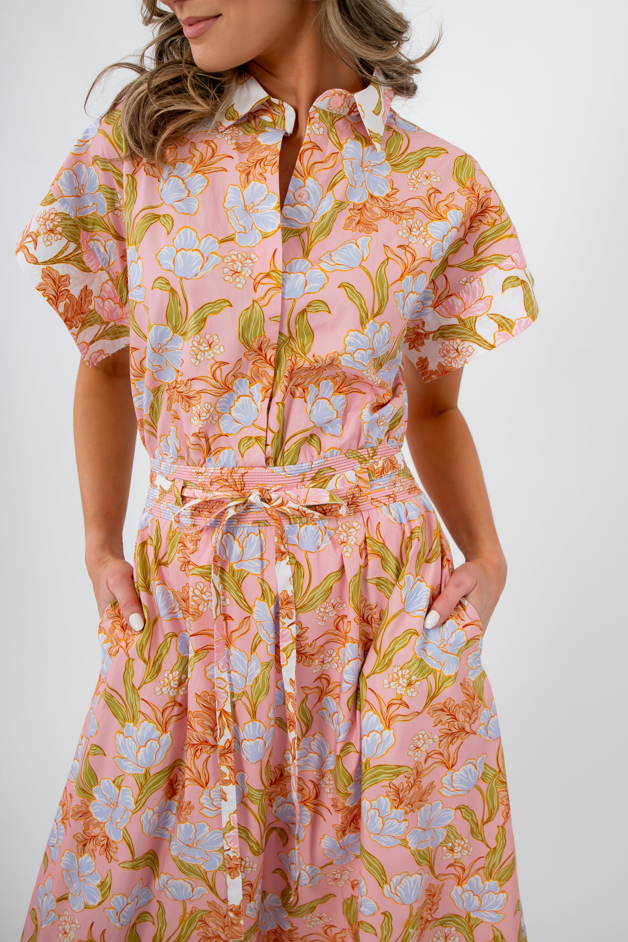 Coral Gables Floral Midi Shirt Dress with button-front and collared neckline in pink-orange floral print, perfect for spring and summer styling.