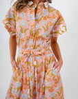 Coral Gables Floral Midi Shirt Dress with button-front and collared neckline in pink-orange floral print, perfect for spring and summer styling.
