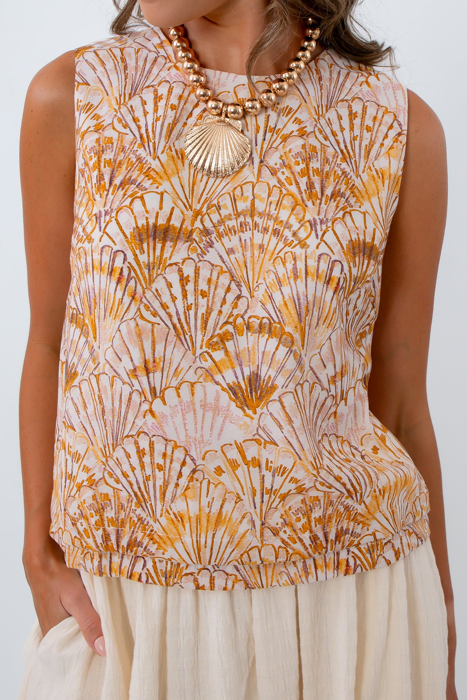 Sleeveless high neck beach top with shell pattern perfect for vacation