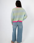 Back view of Cabana Stripe Lightweight Sweater with mint and sky blue stripes and pink hem, highlighting breathable knit fabric and casual fit.