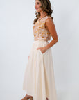 Fully lined cotton midi skirt with elastic waist and side pockets paired with coastal seashell tank for summer