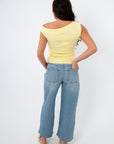Back view of Friday Feeling Butter Yellow Asymmetrical Knit Top showing off-shoulder design. Chic and comfortable spring knit tank top.