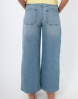 Back view of Kimberly Light Denim Cropped Wide Leg Jean featuring classic rear patch pockets and relaxed wide leg cut.
