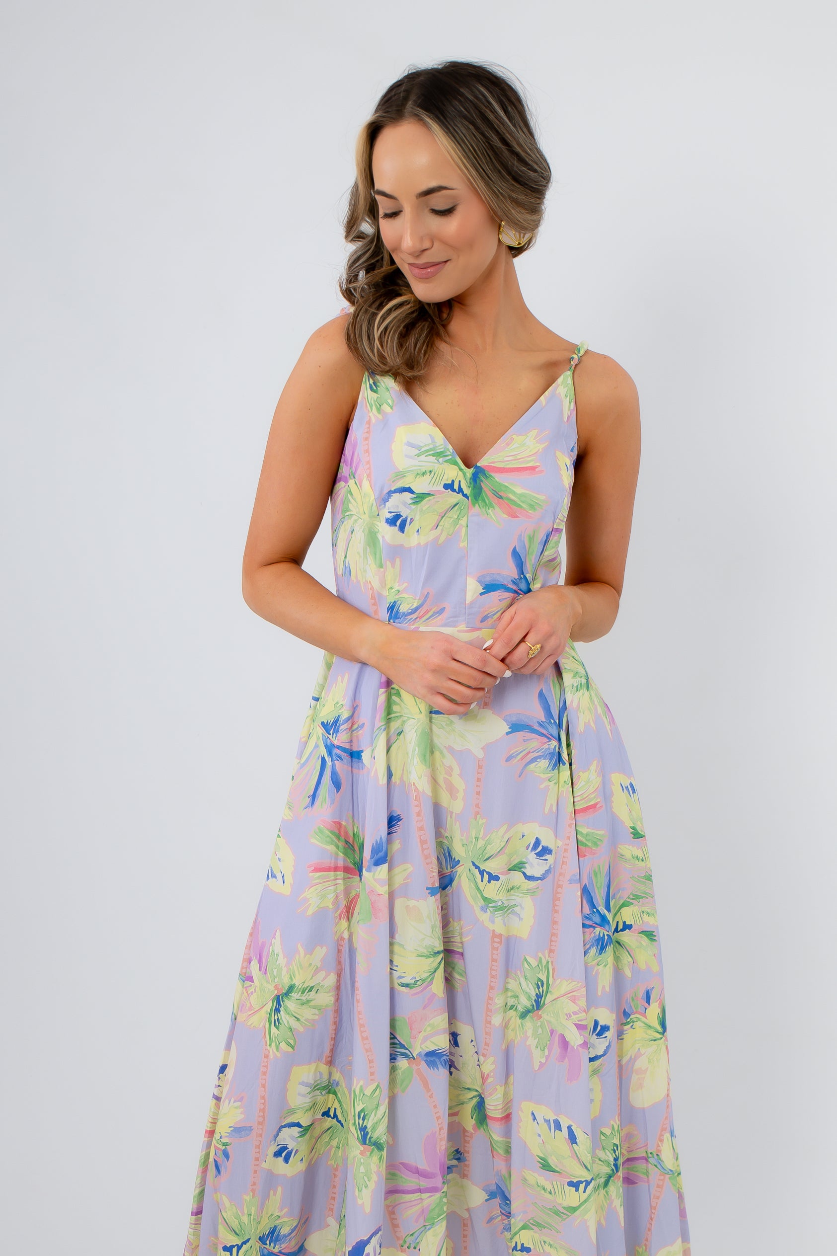 Palm Springs Lavender Printed Midi Dress with floral pastel print and braided straps, ideal for summer weddings and vacations.