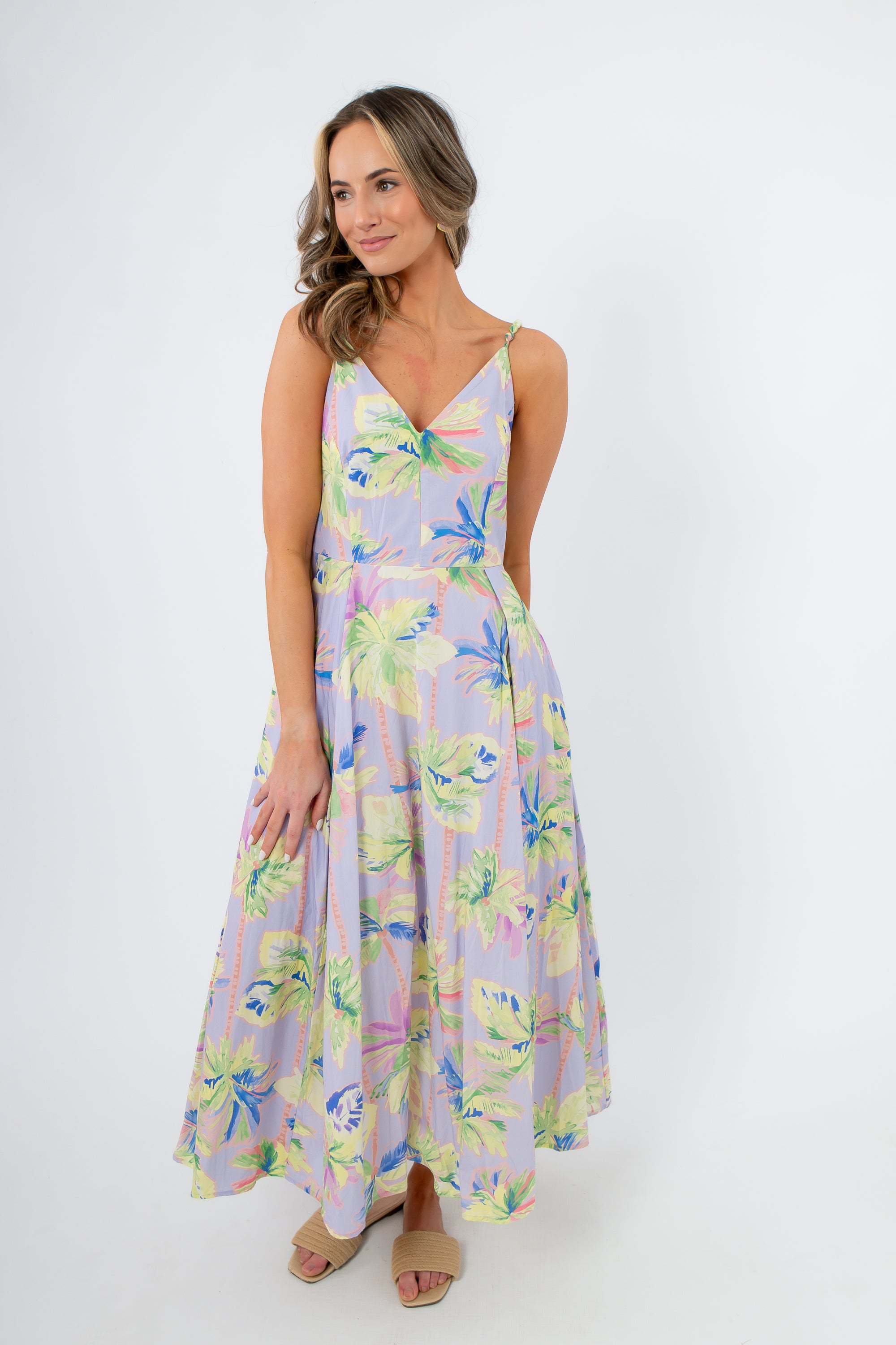 Lavender Midi Dress featuring a breezy A-line silhouette and tropical floral design, perfect for spring and summer occasions.