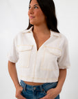 White denim contrast stitch short sleeve top with front pockets