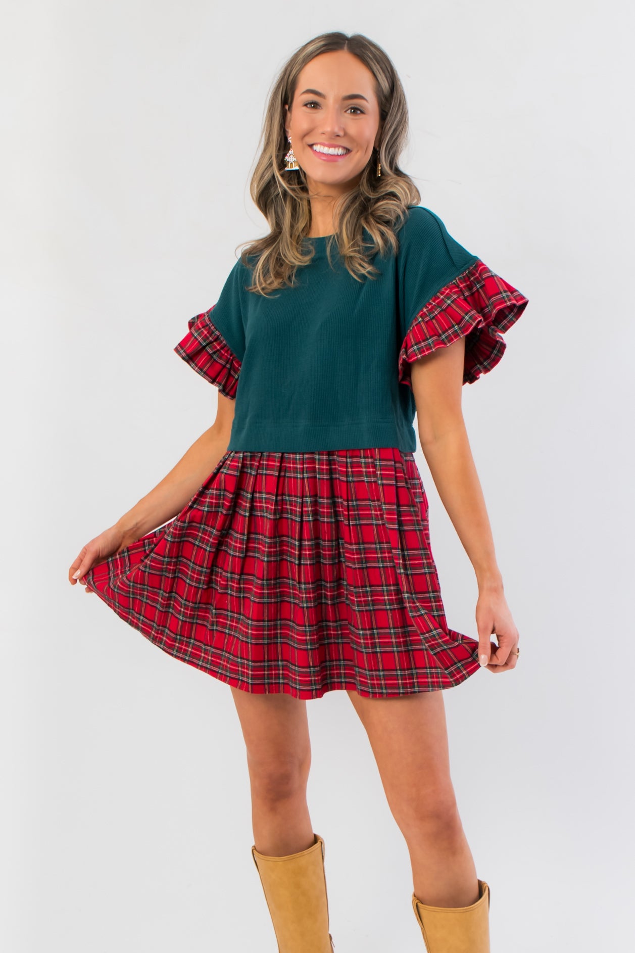 Festive Mistletoe Moment Tartan Plaid Babydoll Dress featuring ruffled sleeves and a flared red plaid skirt, ideal for casual Xmas gatherings.