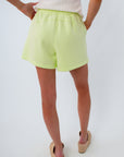 vibrant green spanx shorts