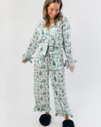 Heritage Holiday Toile Green Pajama Set – Festive & Cozy loungewear with button-down top, elastic waistband, and charming holiday graphics.