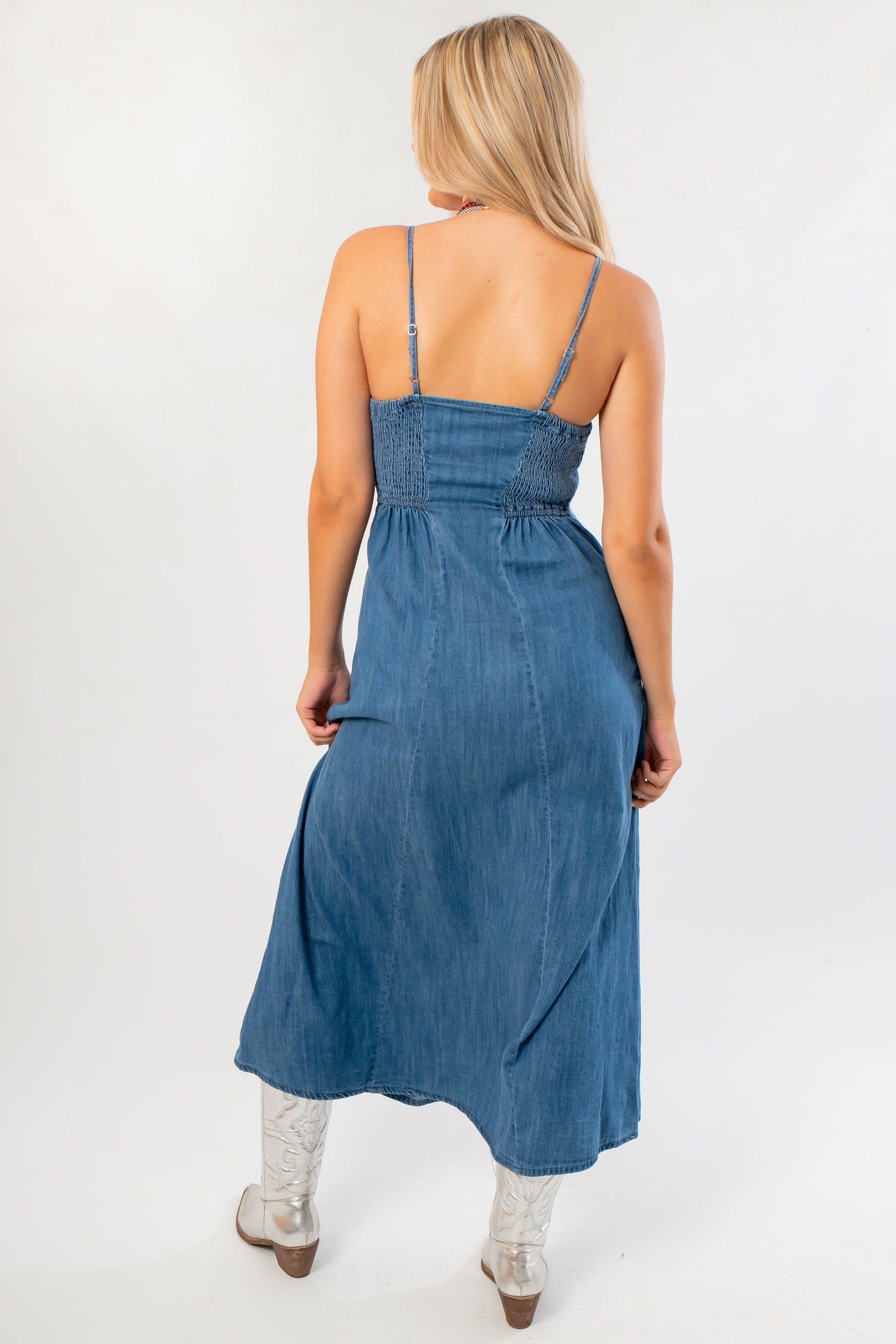 Back view of Z Supply Angel Eyes Denim Midi Dress in medium indigo with smocked back detail and midi length for casual elegance.