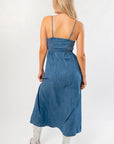 Back view of Z Supply Angel Eyes Denim Midi Dress in medium indigo with smocked back detail and midi length for casual elegance.