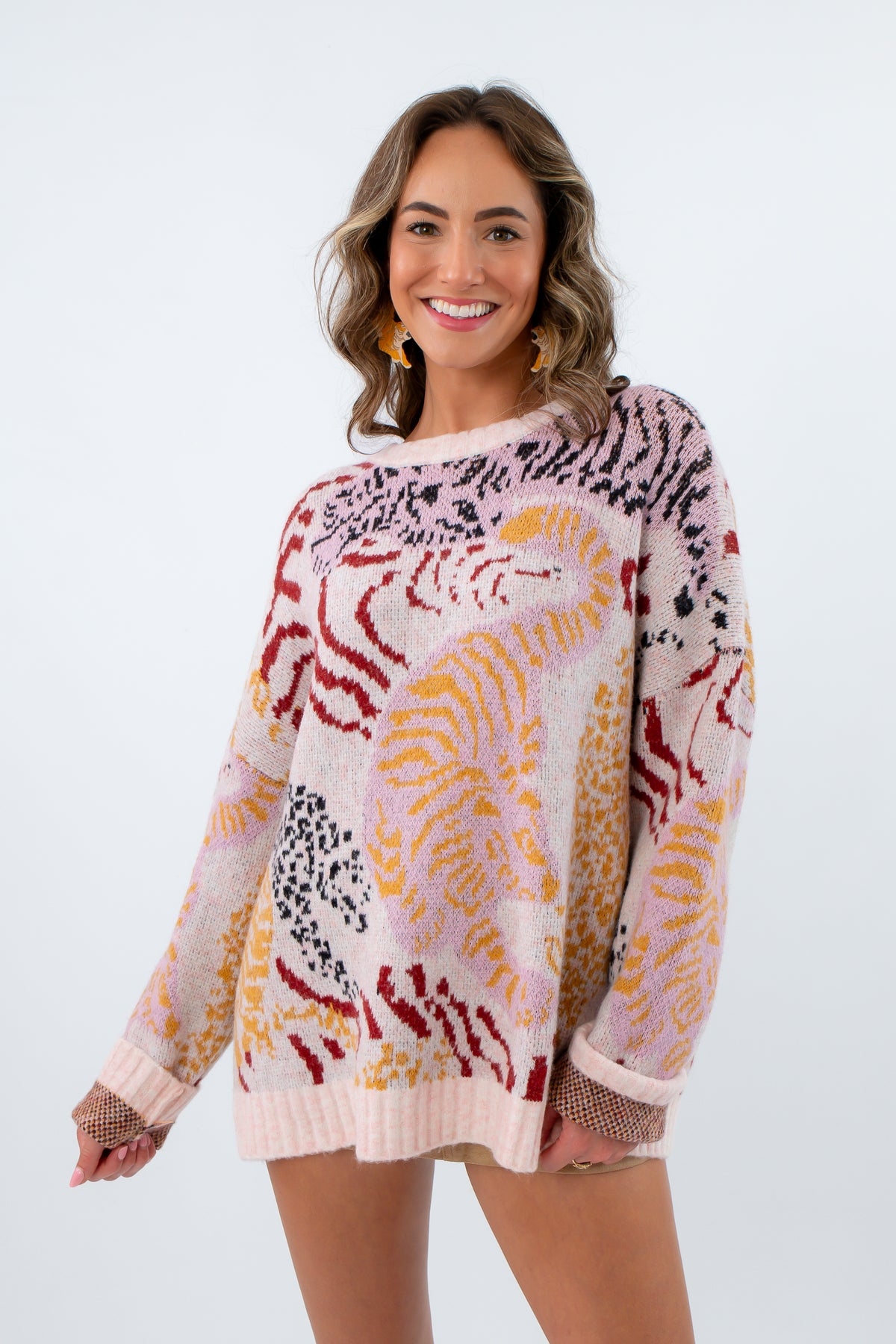 Colorful tiger print sweater for fall, long sleeve sweater with tigers all over it, colorful sweater with tigers on it