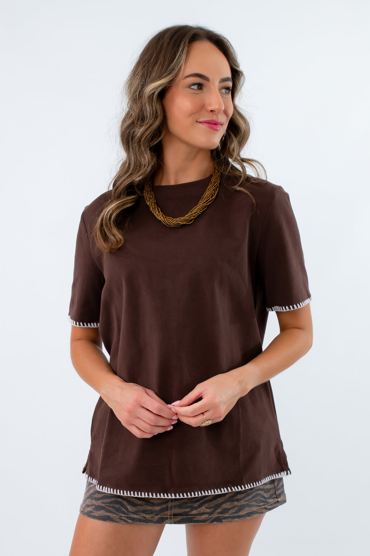 brown and white oversized gameday casual outfit tshirt football inspired