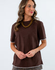 brown and white oversized gameday casual outfit tshirt football inspired