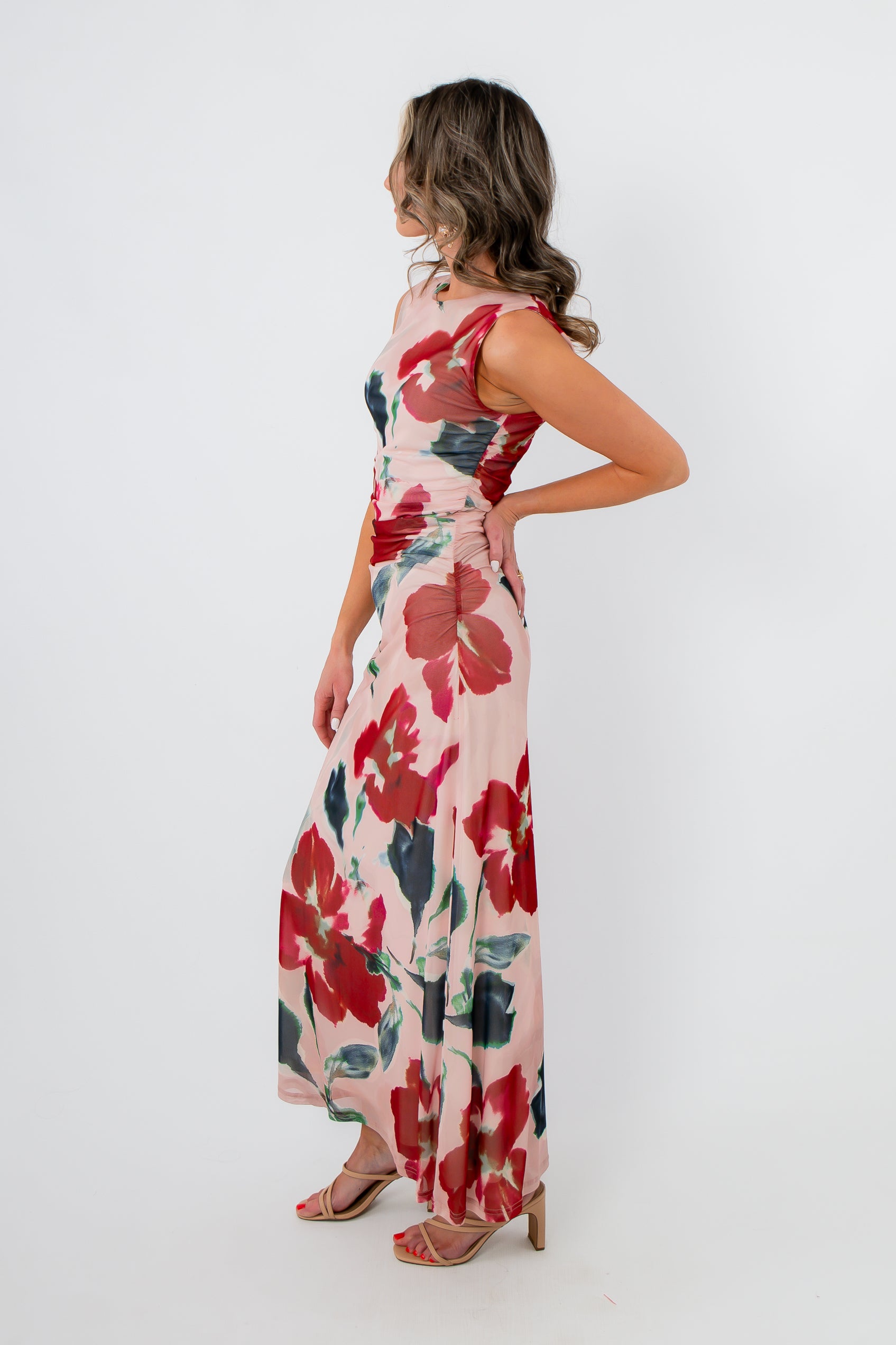 Side view of MinkPink Red Floral Arabella Mesh Midi Dress showing ruched waist and flowing silhouette, great for spring weddings.