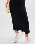 Close-up of Z Supply True Black Gail Midi Skirt showing soft cotton texture and sleek silhouette. A versatile black midi skirt for any occasion.