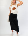 Football Sweater - Ned Bedazzled styled with black midi skirt and white sneakers, perfect for sporty and stylish game day looks.