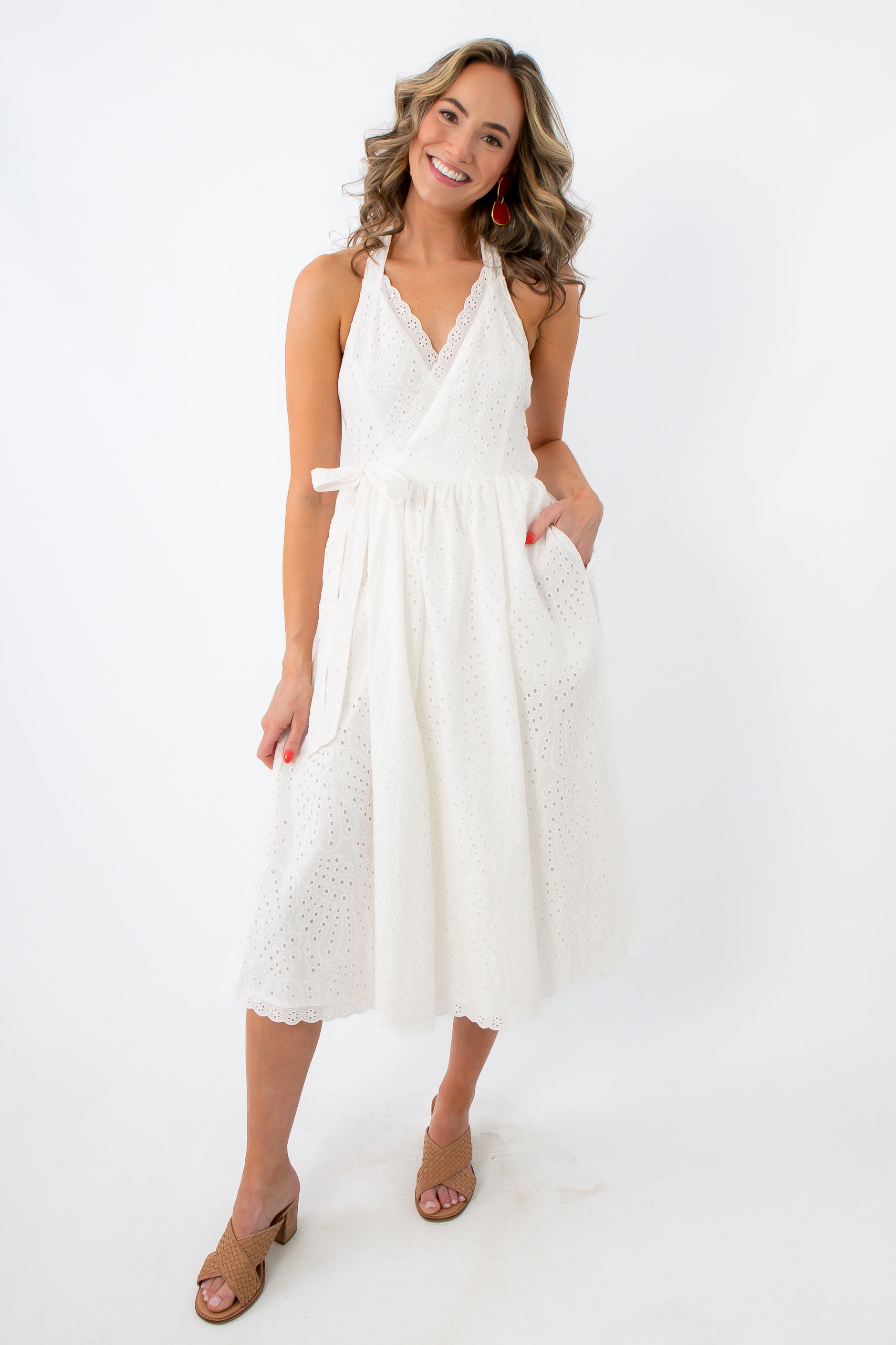 White eyelet midi dress with tie waist for summer and bridal photos