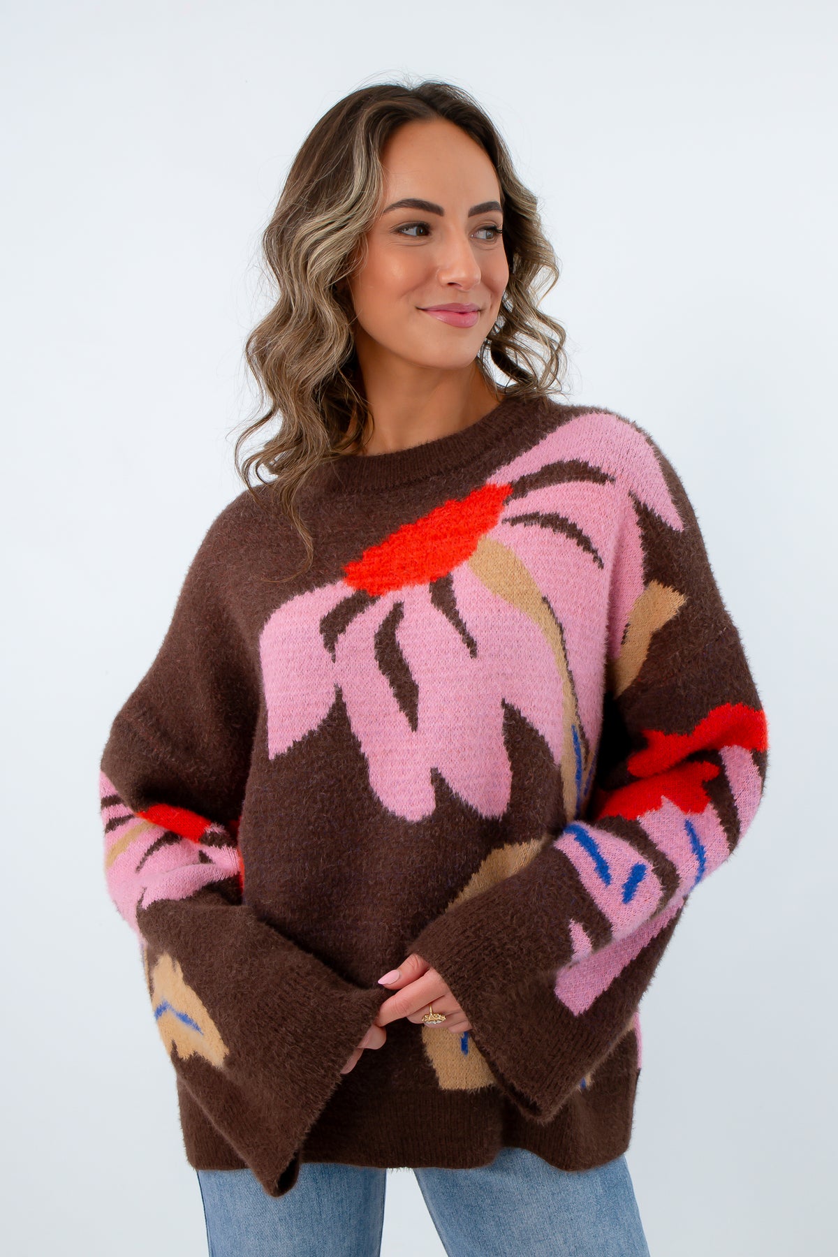 Oversized cropped fall sweater with intarsia floral pattern, brown sweater with pink flowers all over it, brown floral sweater