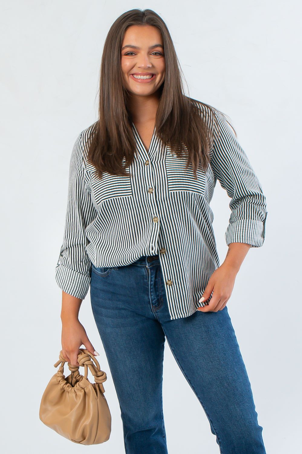 Dark Green Striped Button Down – Perfect Fall Work Shirt styled with blue jeans and tan handbag, ideal for office or casual autumn outfits.