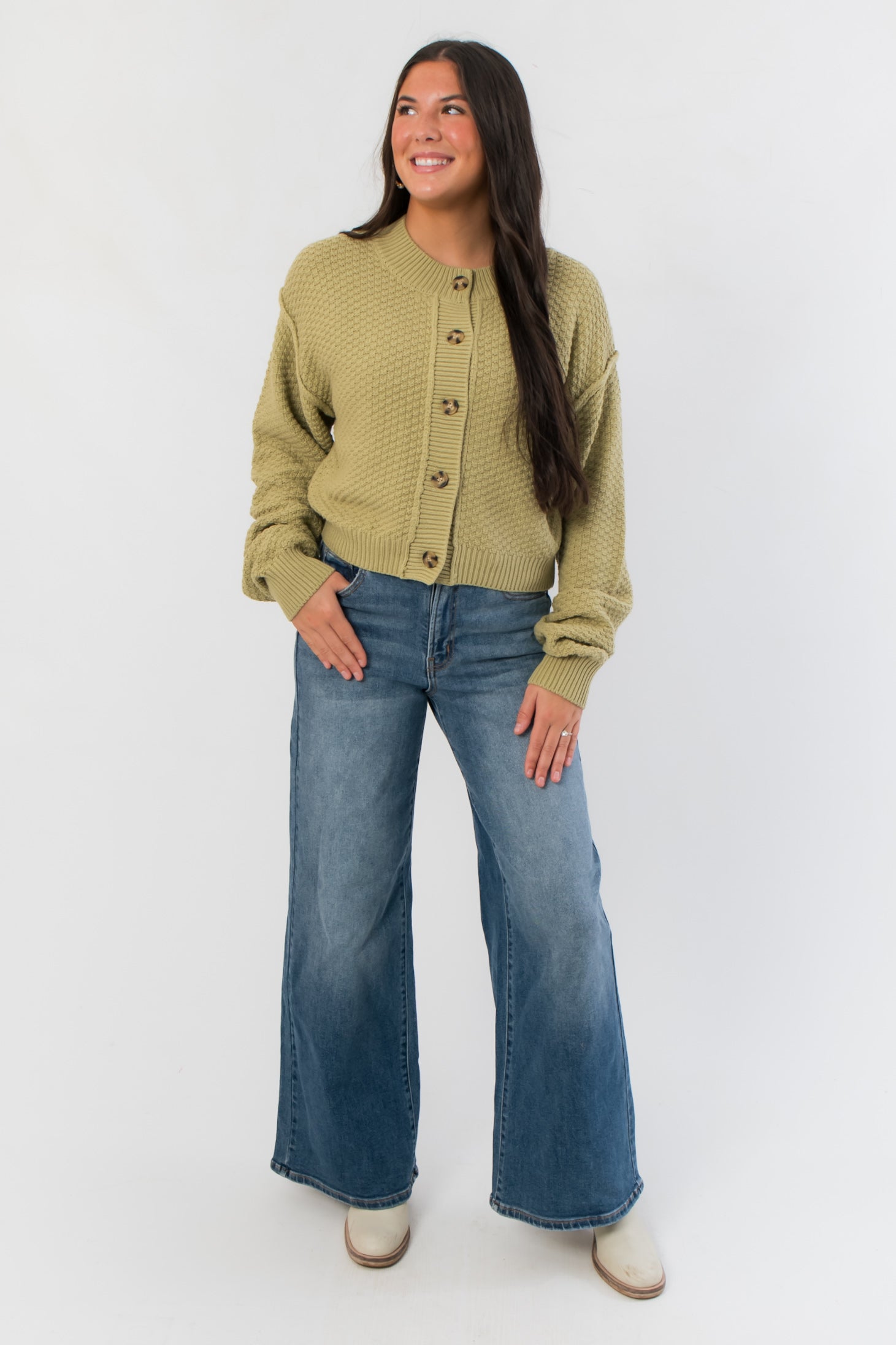 Relaxed and stylish Free People Whispering Willow Lila Cardigan paired with wide-leg jeans, ideal for cozy fall outfits.